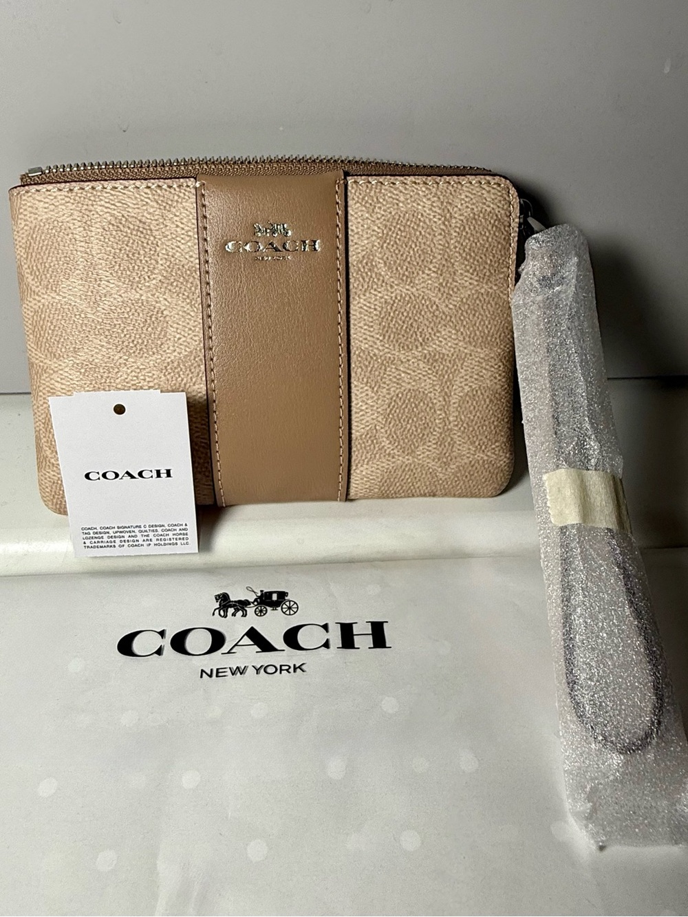 Coach Beige Signature Wristlet with Tan Leather Trim
